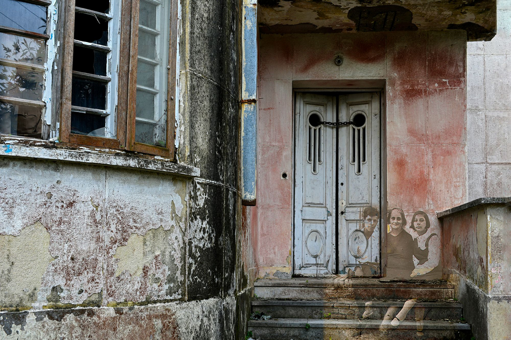 family portrait overlaid building in ruins